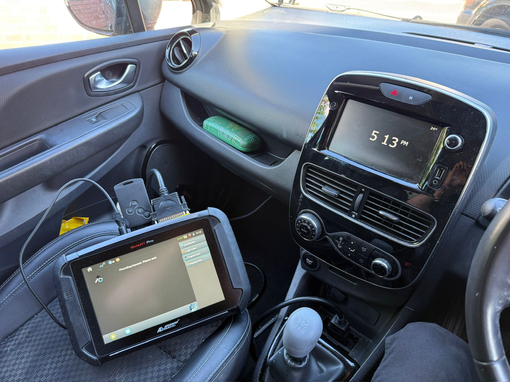 Auto locksmith key programming equipment in use in Kettering